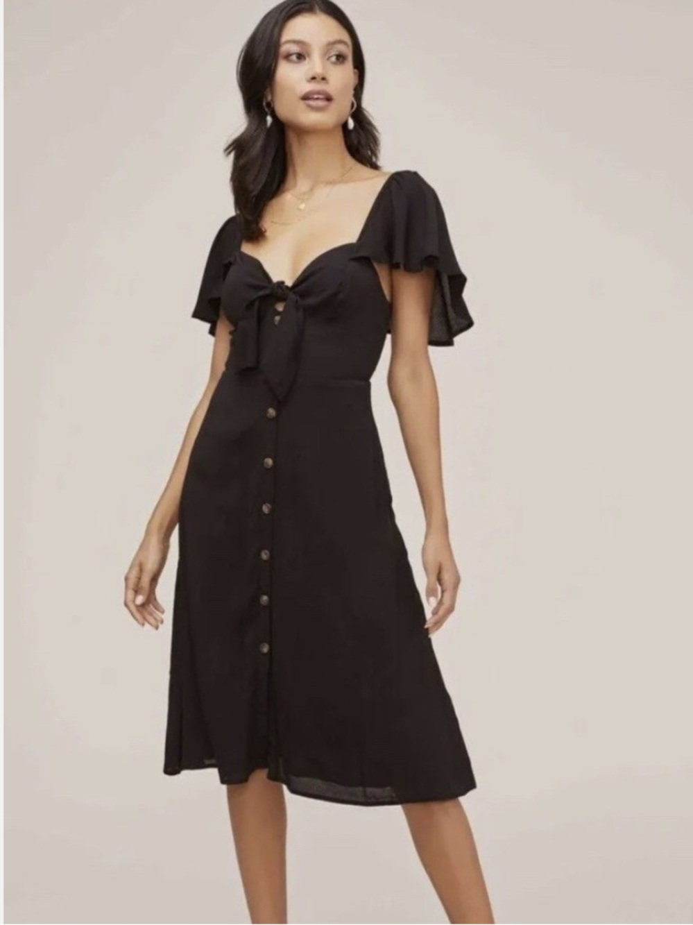 ASTR black midi dress with flutter sleeves and top tie. Buttons down front